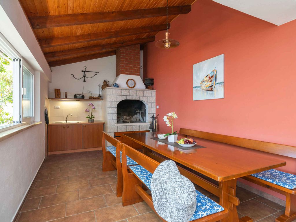 Ferienhaus mit Pool und Meerblick