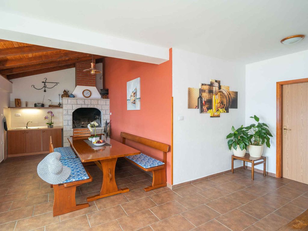 Ferienhaus mit Pool und Meerblick