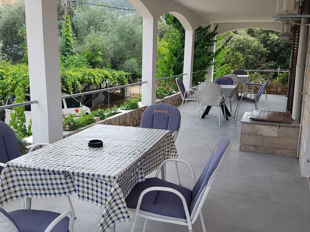 Ferienhaus mit Terrasse und Grill, am Meer