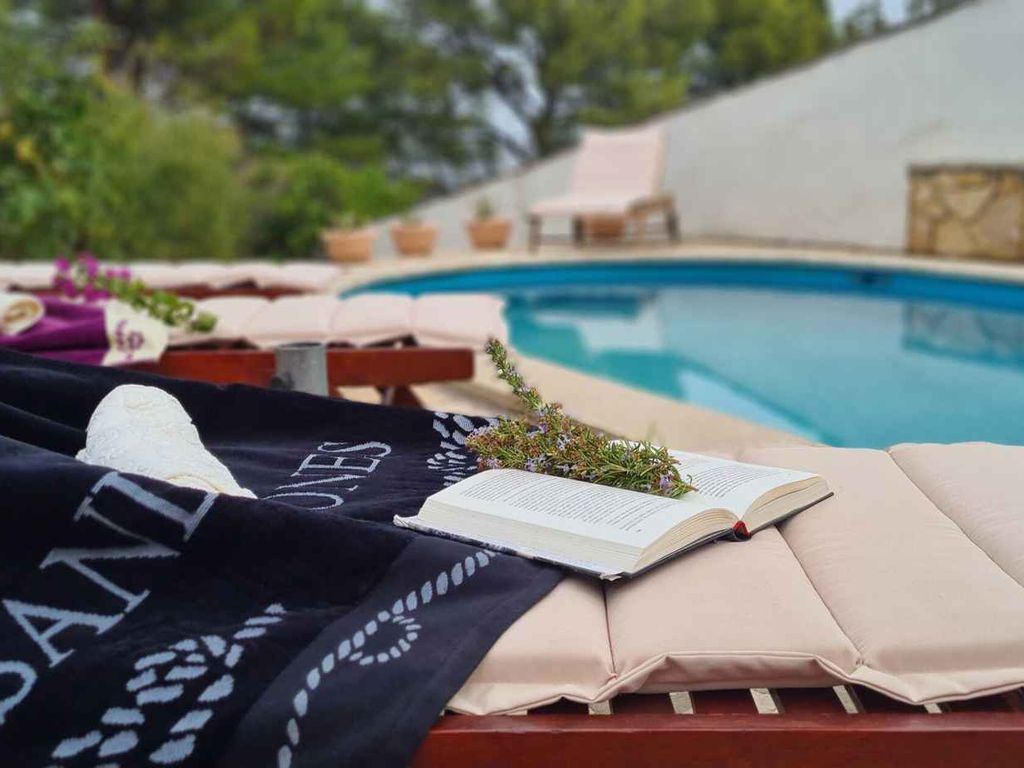 Ferienwohnung mit Gemeinschaftspool und Meerblick