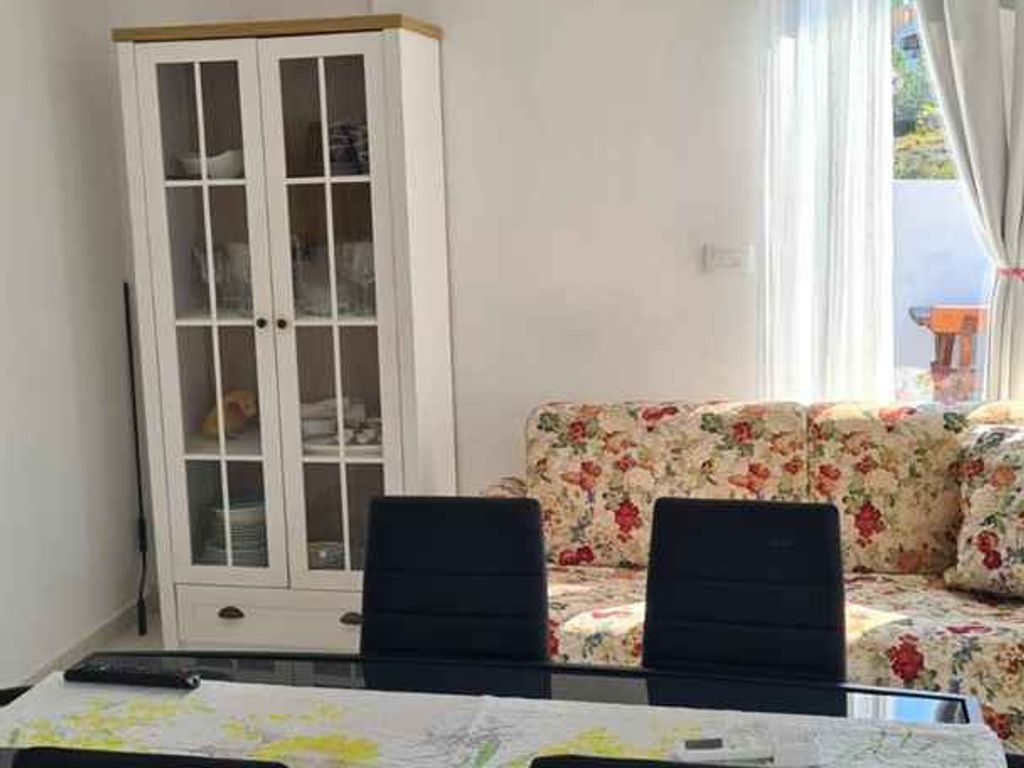 Ferienhaus mit Terrasse und Meerblick