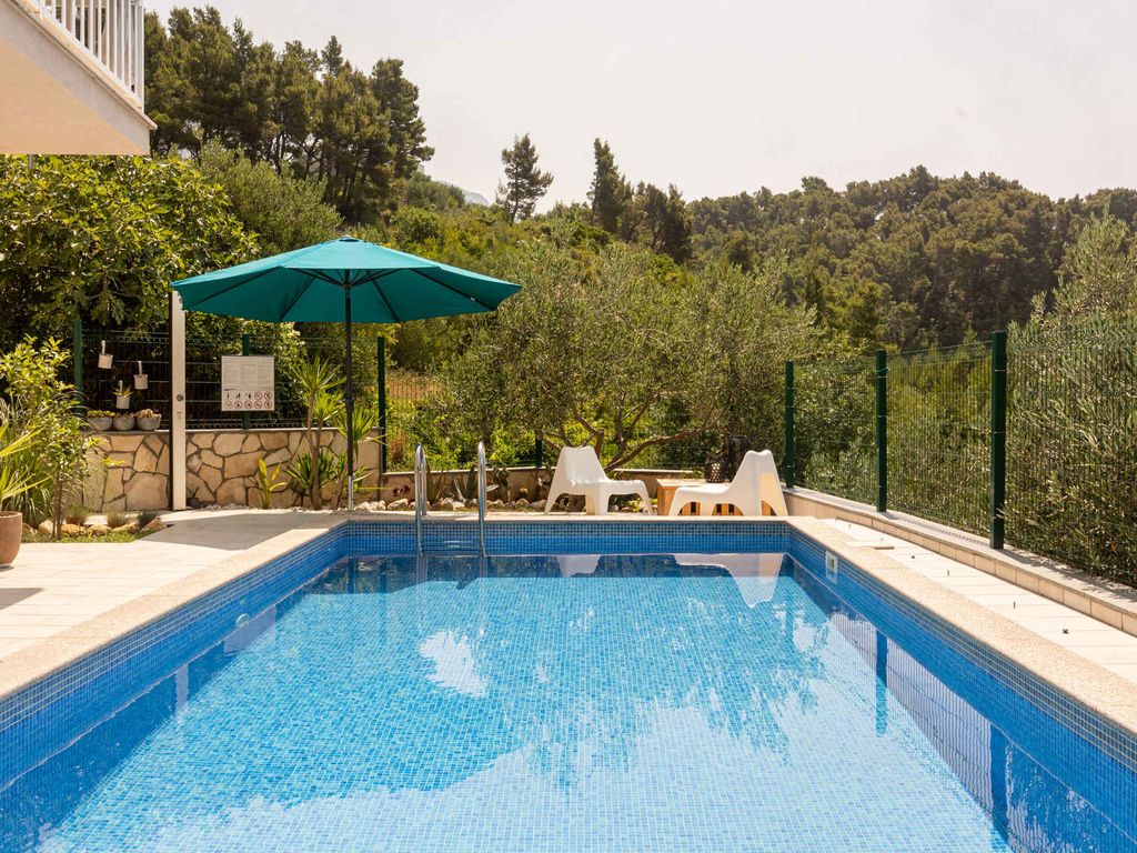 Ferienwohnung mit Meerblick und Pool