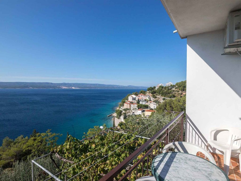 Ferienwohnung mit einem Balkon und Grillmöglichkeit