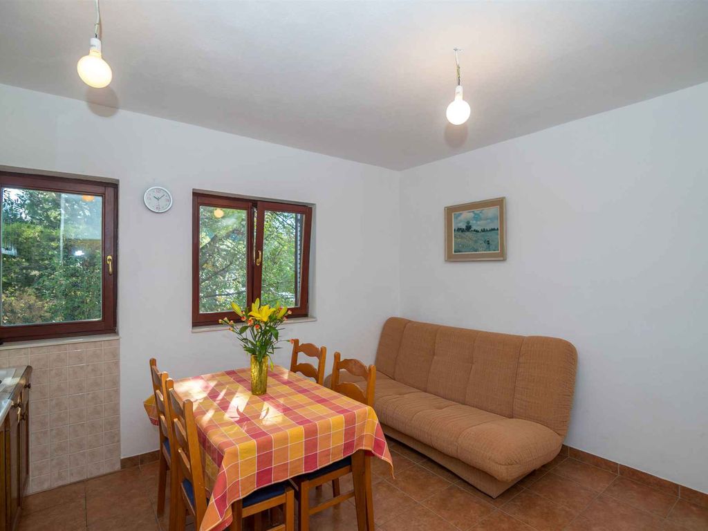 Ferienwohnung mit einem Balkon und Grillmöglichkeit