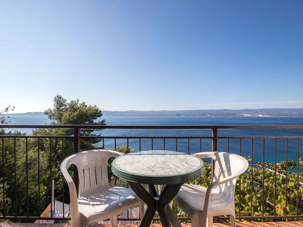 Ferienwohnung mit einem Balkon und Grillmöglichkeit
