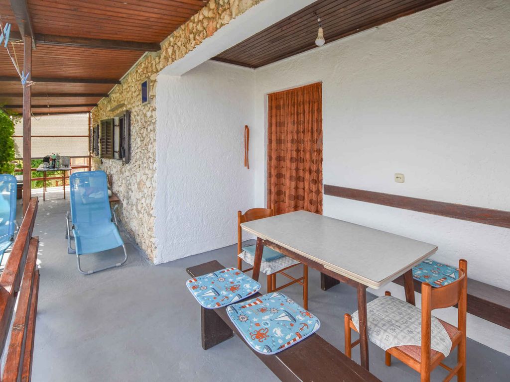 Ferienhaus mit Garten und Meerblick