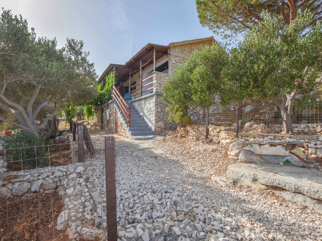 Ferienhaus mit Garten und Meerblick