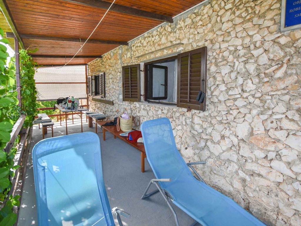 Ferienhaus mit Garten und Meerblick