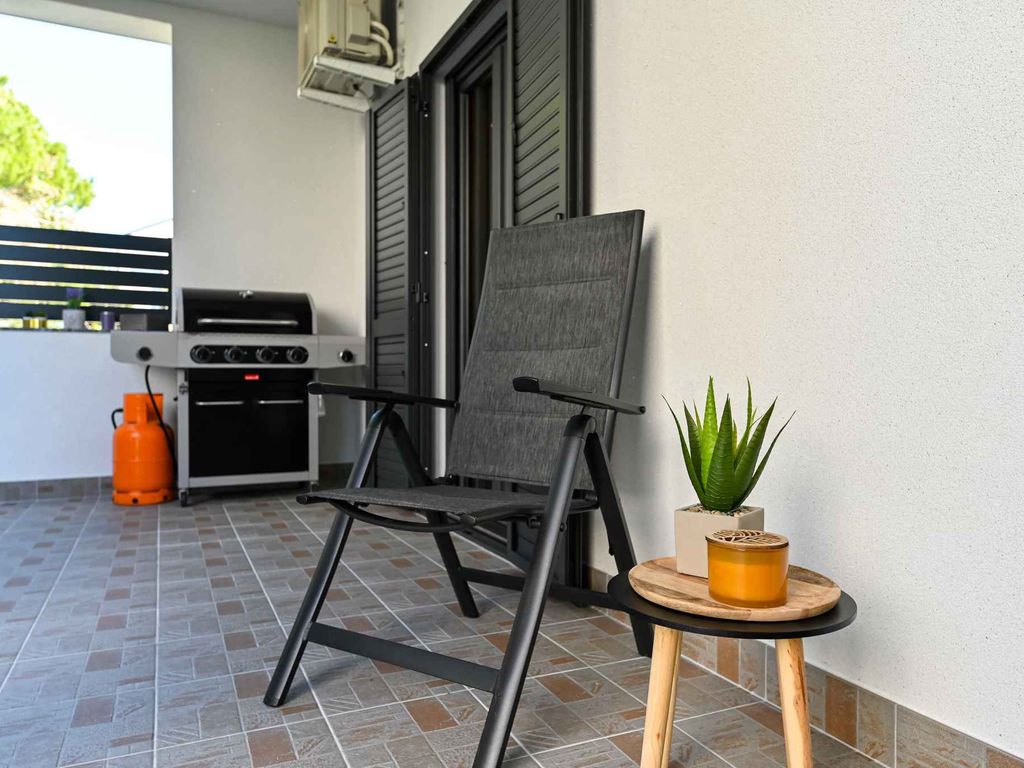 Ferienwohnung mit gemütlicher Terrasse und Grillmöglichkeit