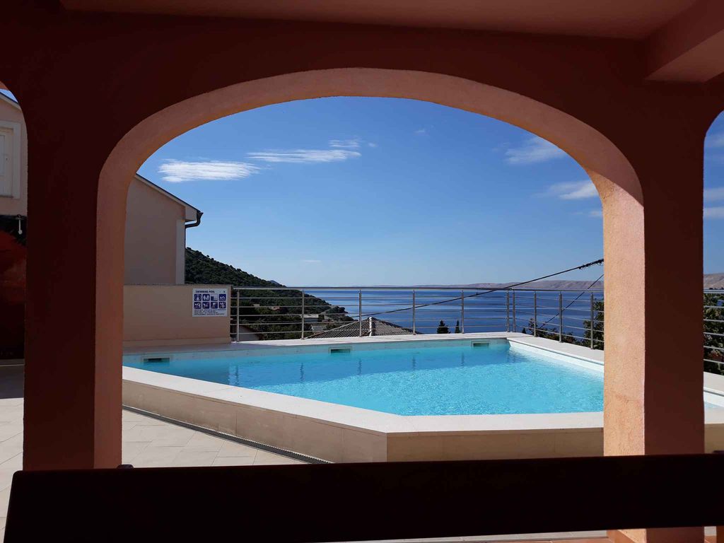 Ferienwohnung mit Meerblick, Klimaanlage und Pool