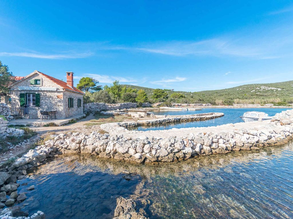 Ferienhaus mit Gartenterrasse und Bootsteg