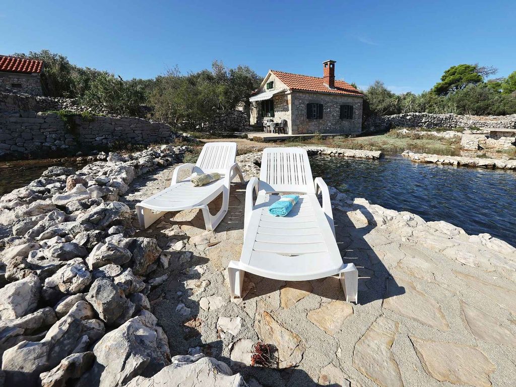 Ferienhaus mit Gartenterrasse und Bootsteg