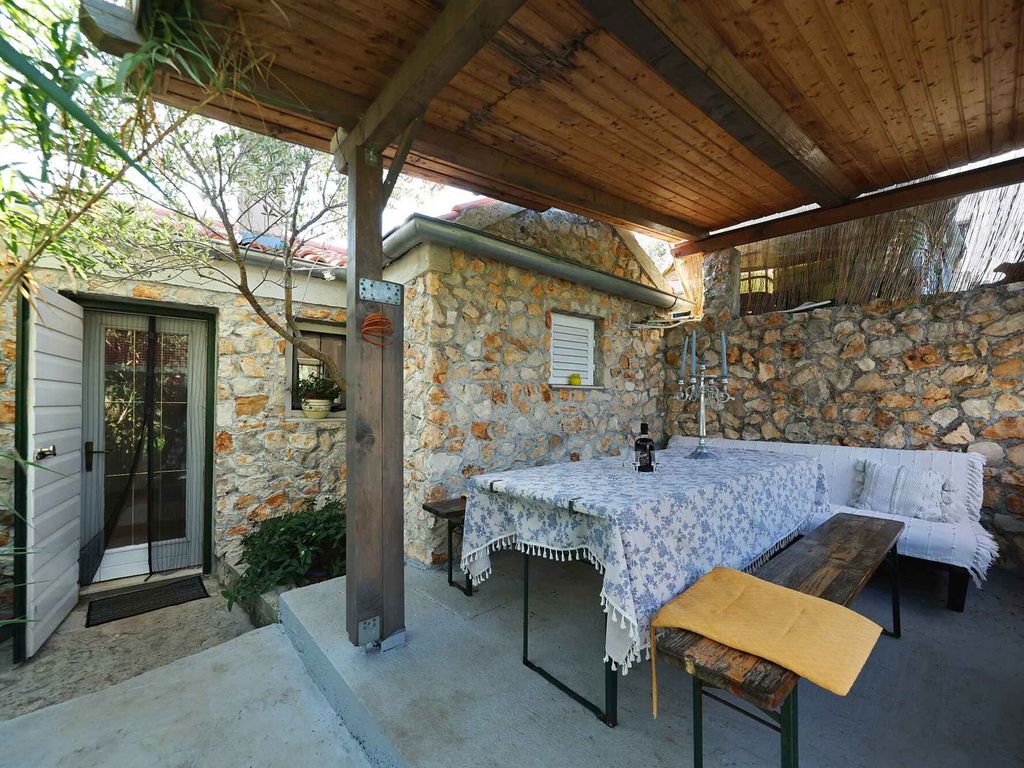 Ferienhaus mit Gartenterrasse und Bootsteg