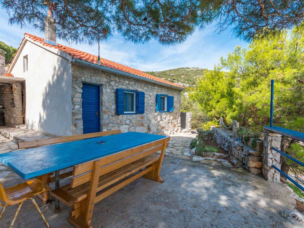 Ferienhaus mit Garten und Meerblick