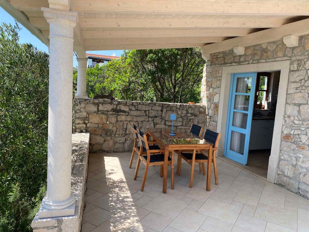 Ferienhaus mit Garten und Meerblick