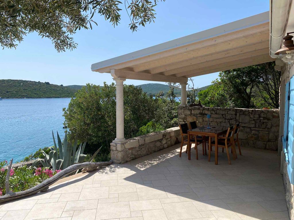 Ferienhaus mit Garten und Meerblick