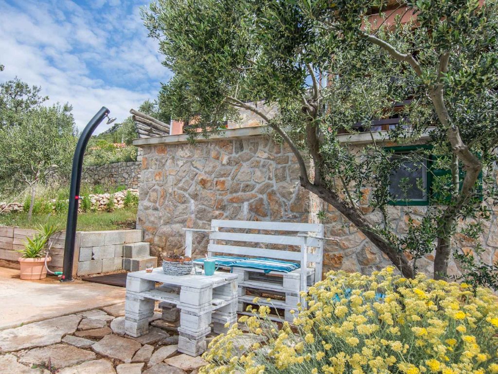 Ferienhaus mit Garten und Meerblick