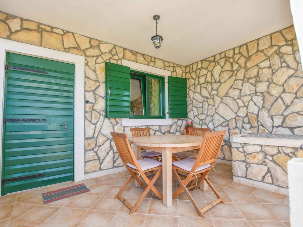 Ferienhaus mit Balkon, Grillmöglichkeit und Meerblick