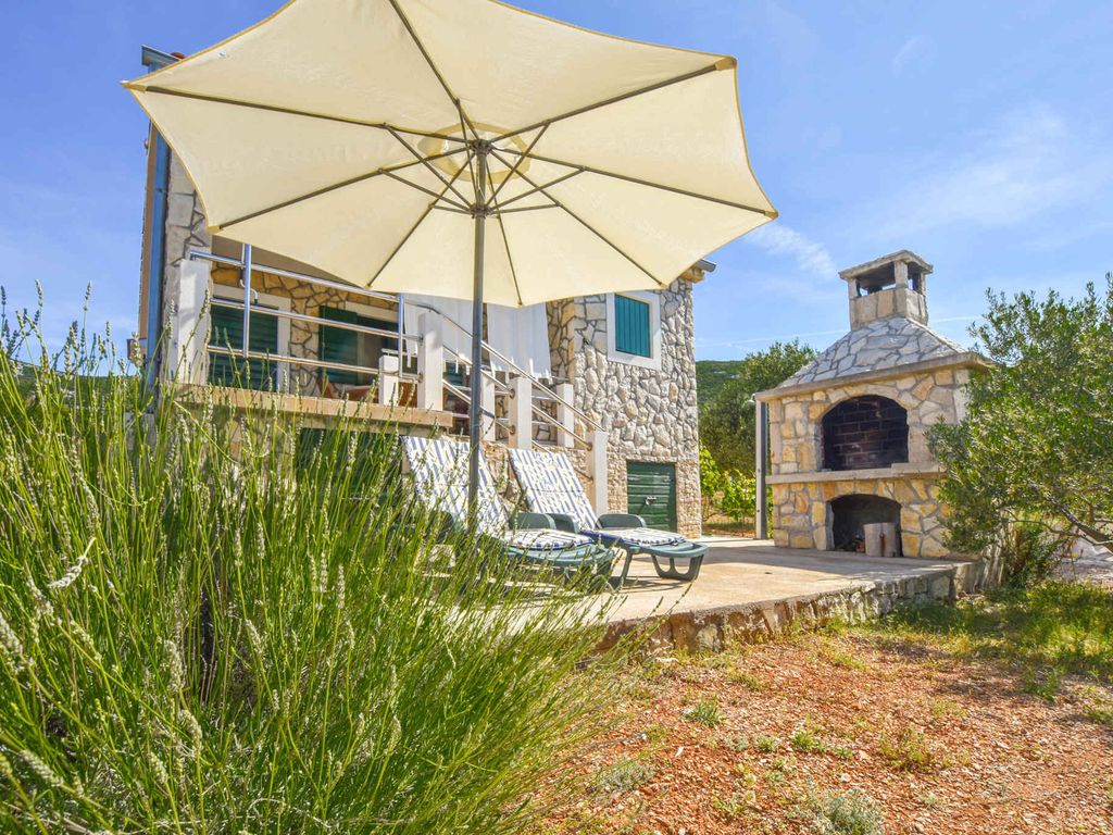 Ferienhaus mit Balkon, Grillmöglichkeit und Meerblick
