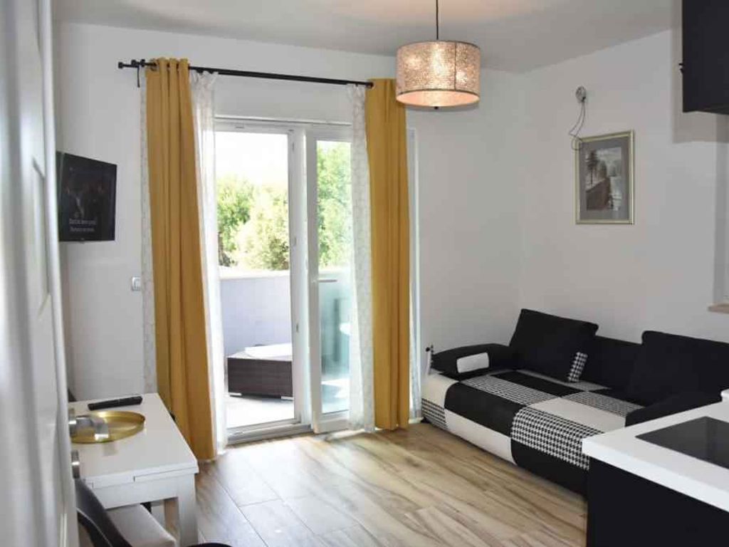 Ferienwohnung mit Meerblick und Terrasse