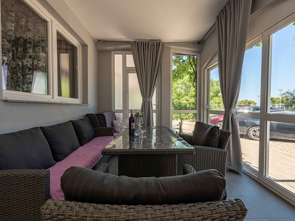 Erdgeschosswohnung mit Meerblick