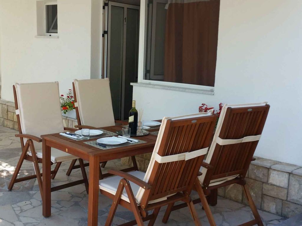 Ferienwohnung mit Terrasse und Grill, am Meer