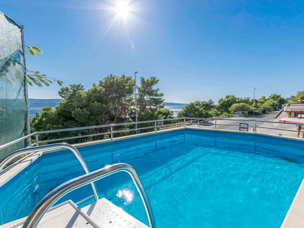 Ferienwohnung mit Gemeinschaftspool und Balkon