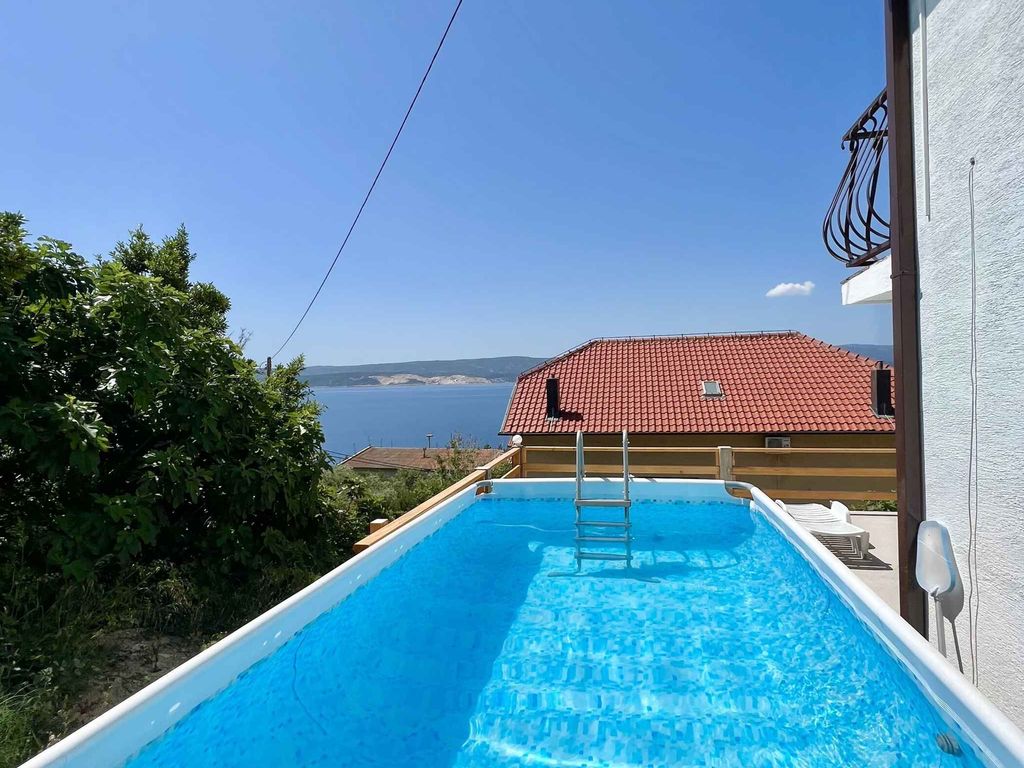 Ferienwohnung mit Balkon, Meerblick und Pool