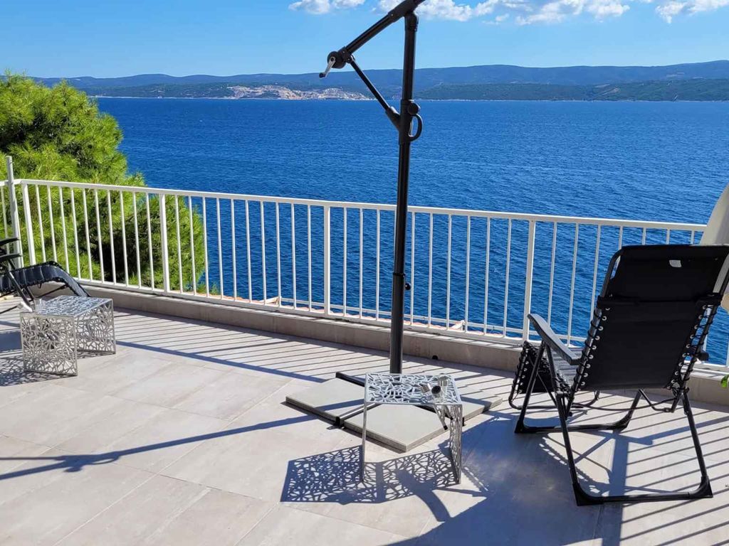 Ferienwohnung mit Terrasse und Meerblick an der Küste