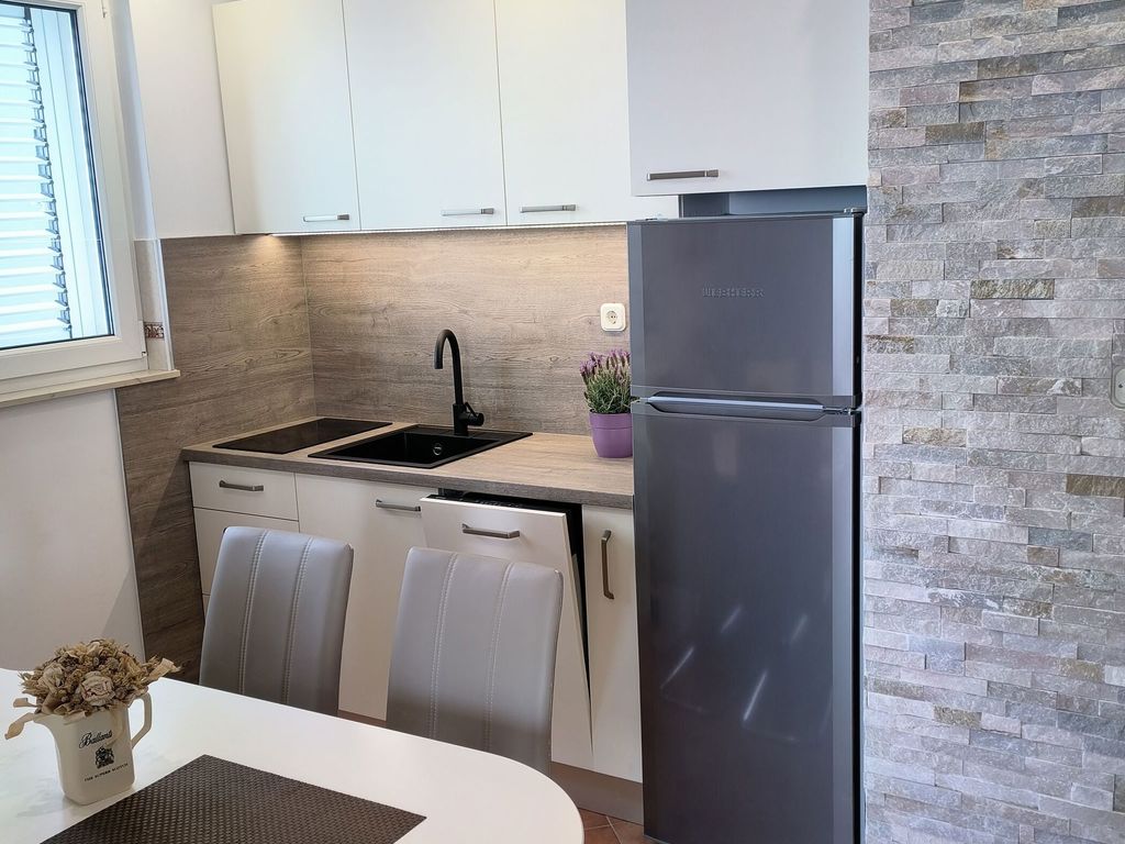 Ferienwohnung mit Balkon und Meerblick
