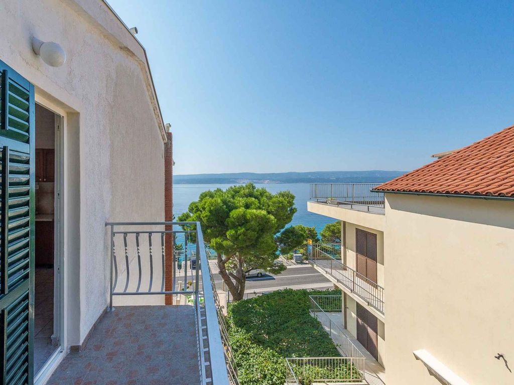 Ferienwohnung mit gemeinsamer Terrasse direkt am Meer