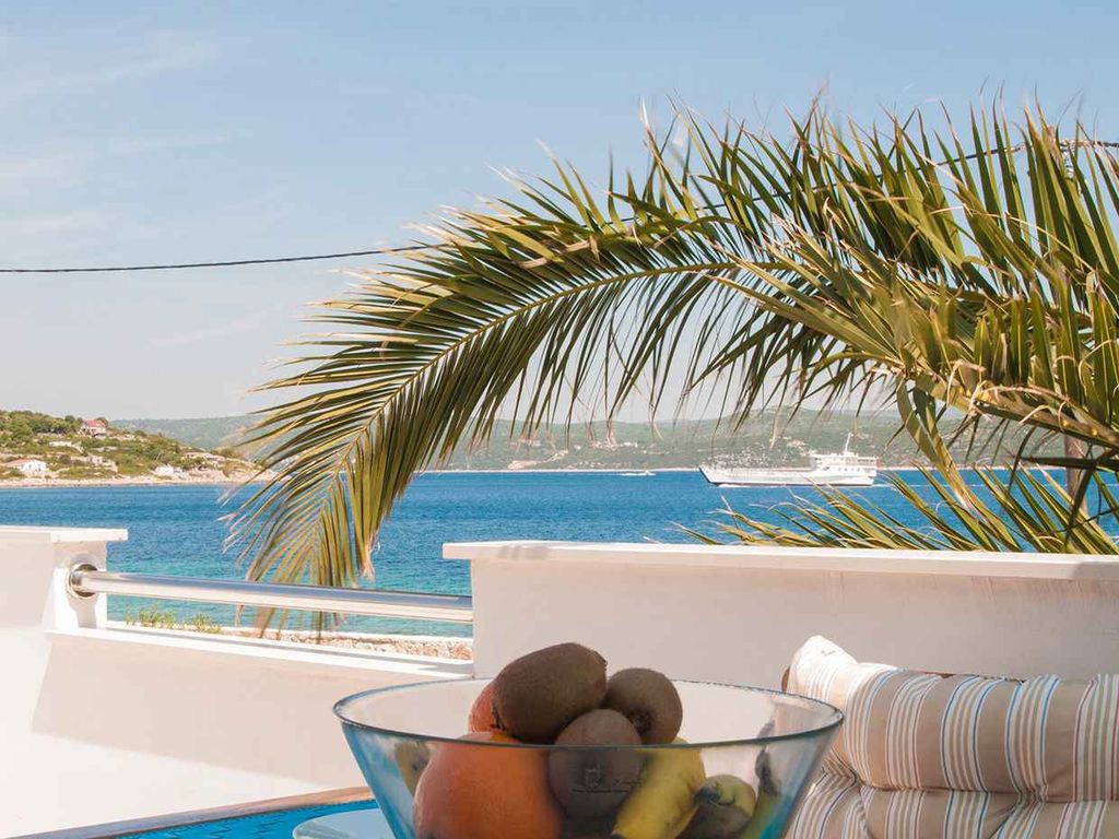 Ferienwohnung mit Klimaanlage und Terrasse direkt am Meer