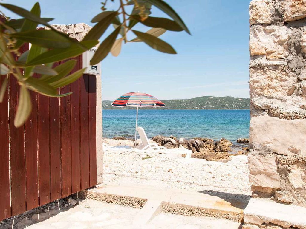 Ferienwohnung mit Klimaanlage und Terrasse direkt am Meer