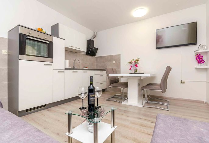 Ferienwohnung mit Klimaanlage und Terrasse in der Nähe vom Strand
