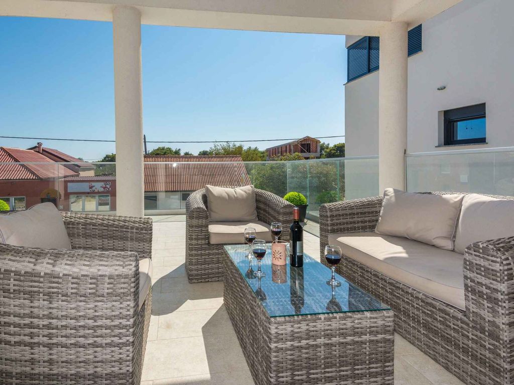 Ferienwohnung mit Klimaanlage und Balkon