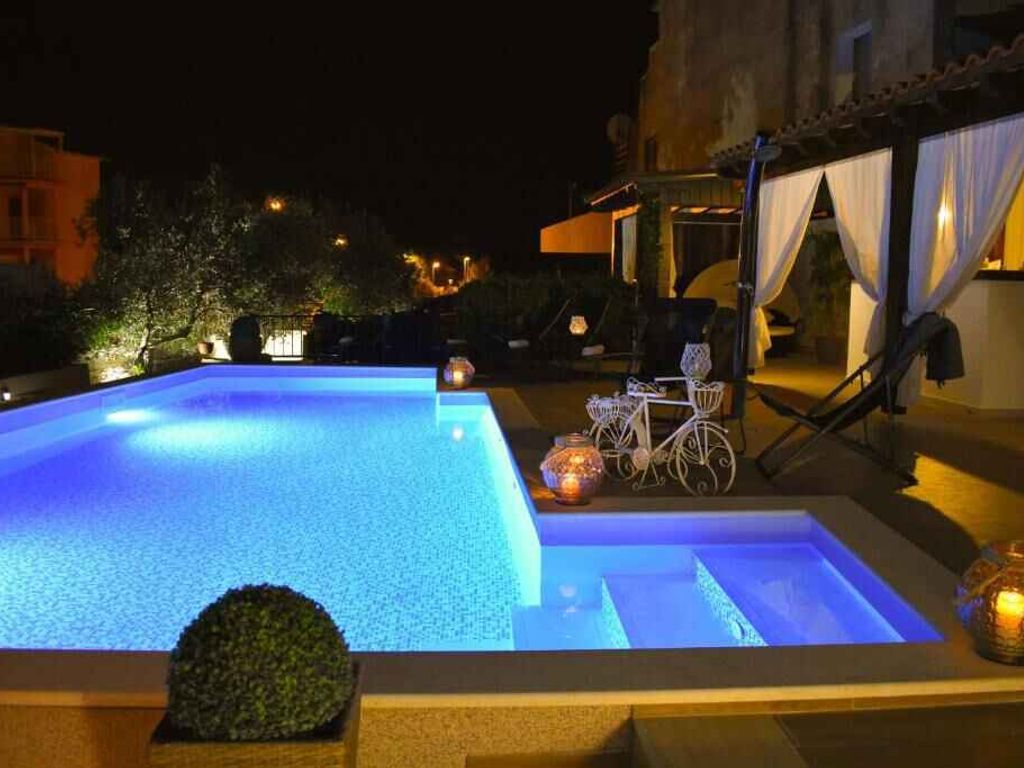 Ferienwohnung mit Pool und Whirlpool in Strandnähe
