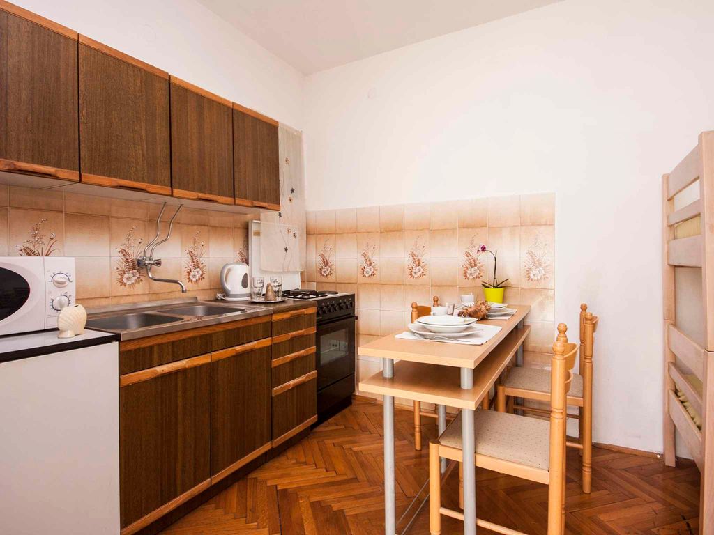 Studio-Apartment für 2+1 Personen mit eigenem Balkon und Gemeinschaftsgarten