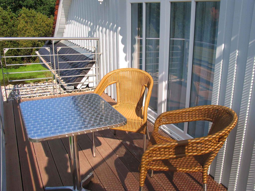 Ferienhaus mit Terrasse und Balkon