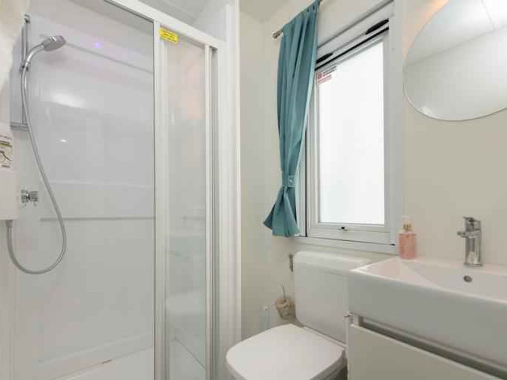 Mobilehome mit Klimaanlage und Holzveranda