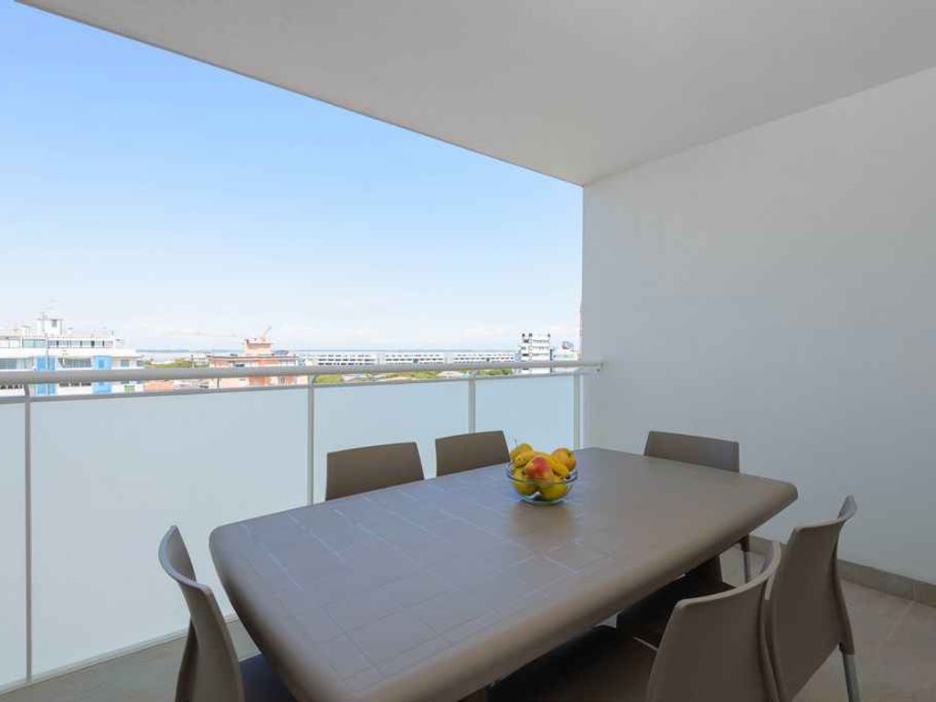 Ferienwohnung mit Klimaanlage und Balkon mit Lagunenblick