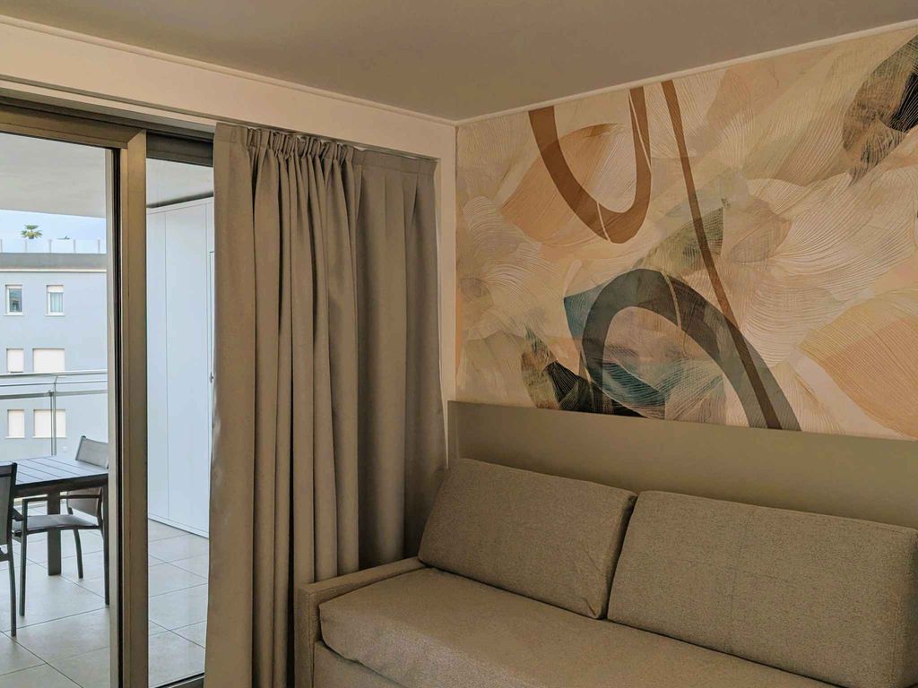 Ferienwohnung im Herzen von Lignano Sabbiadoro mit Balkon, Internet und Klimaanlage