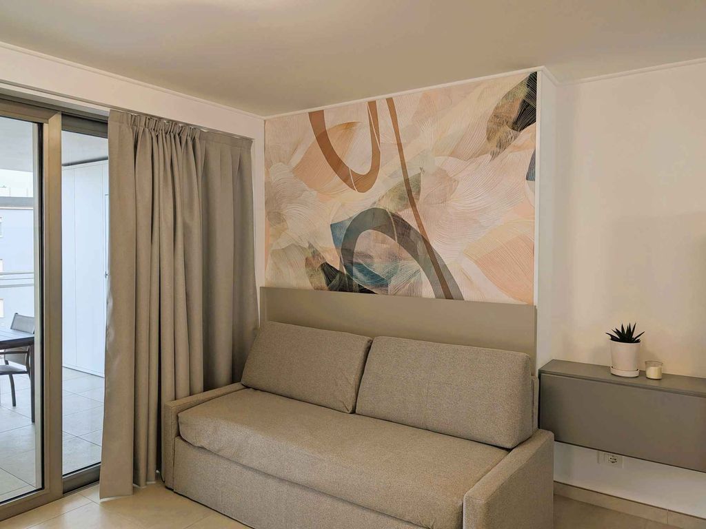 Ferienwohnung im Herzen von Lignano Sabbiadoro mit Balkon, Internet und Klimaanlage