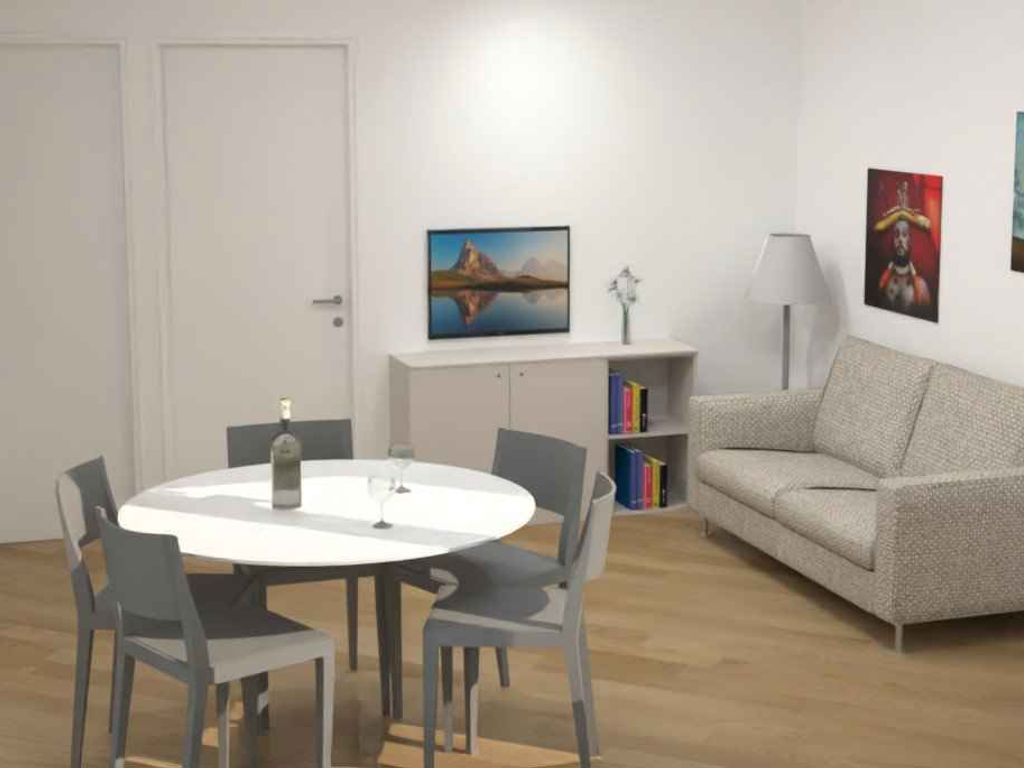 Ferienwohnung mit kleiner möblierter Terrasse