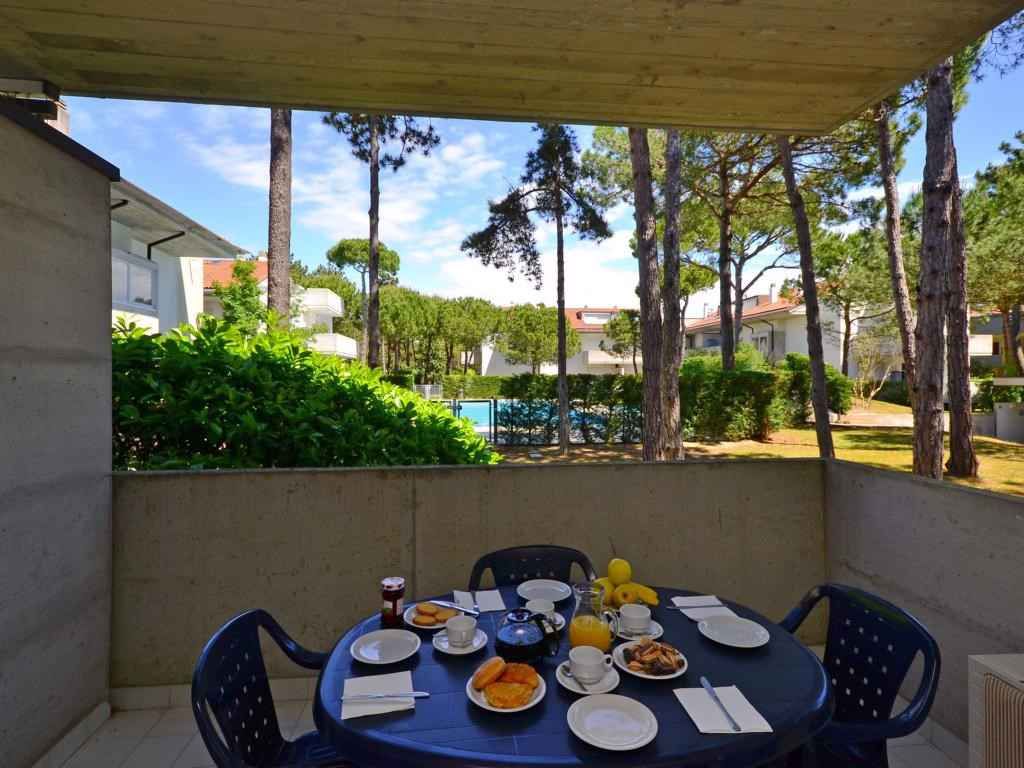 Ferienwohnung mit Klimaanlage, Balkon und Pool in Lignano