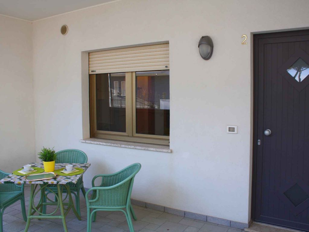 Ferienwohnung mit Terrasse und Klimaanlage im Erdgeschoss