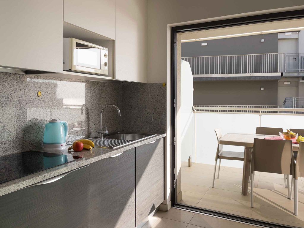 Ferienwohnung mit Klimaanlage und Balkon mit Lagunenblick