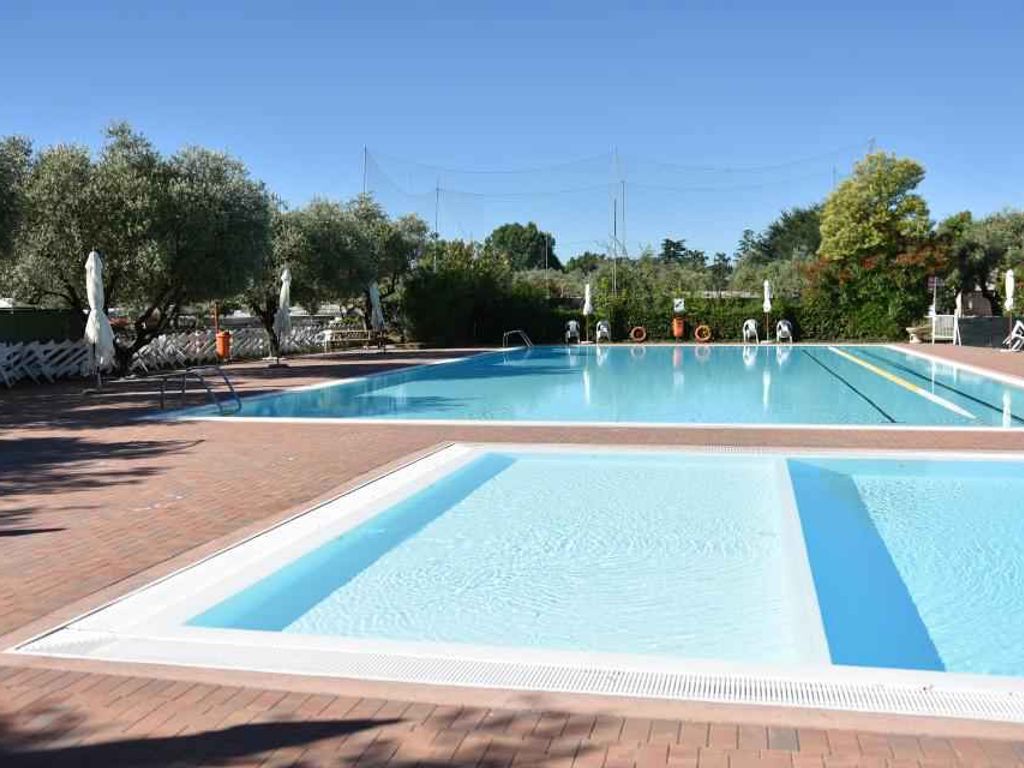 Mobilehome mit Terrasse mit Seeblick, Pool und Klimaanlage