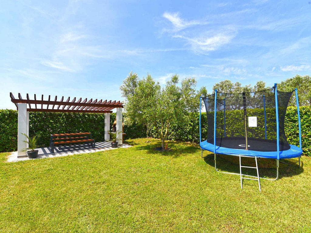 Ferienhaus mit Terrasse und Klimaanlage