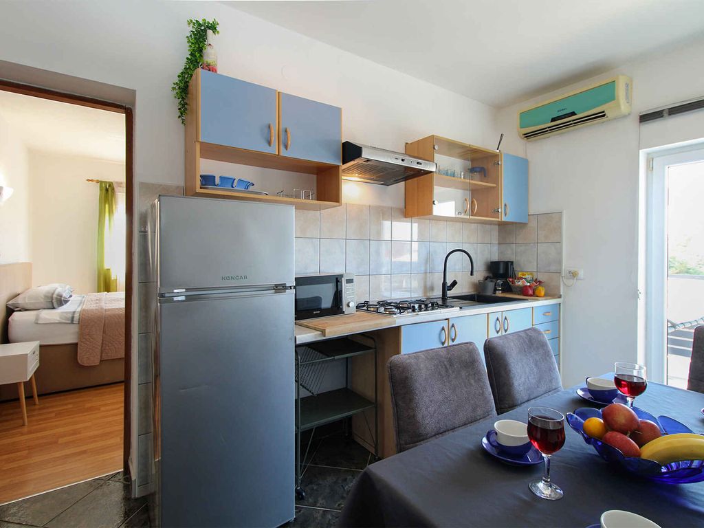 Ferienwohnung mit Gemeinschaftspool und Klimaanlage
