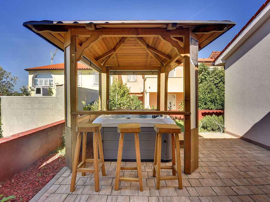 Ferienhaus mit Meerblick und Jacuzzi